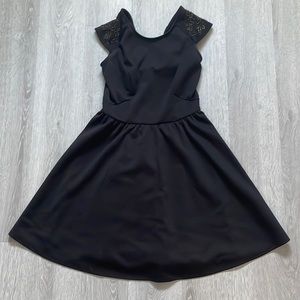 Beaded shoulder little black dress with open back bow